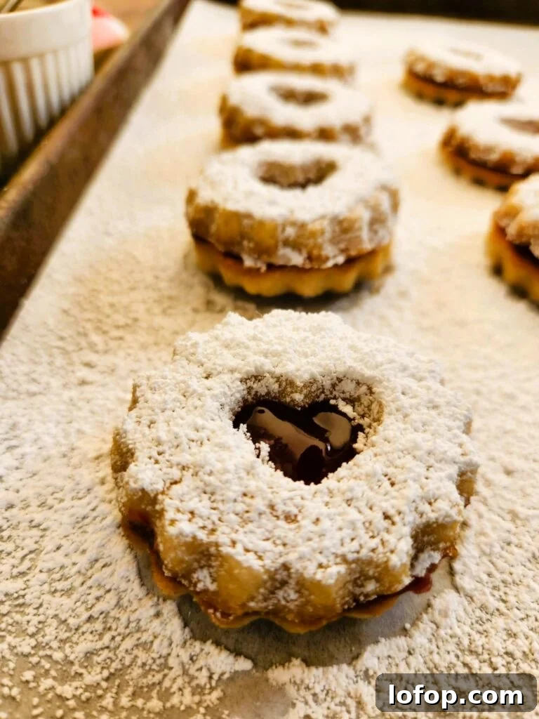 linzer cookies on a baking sheet
