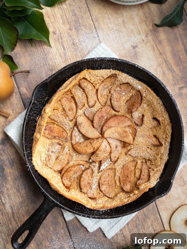 Pear clafoutis made in a cast iron pan