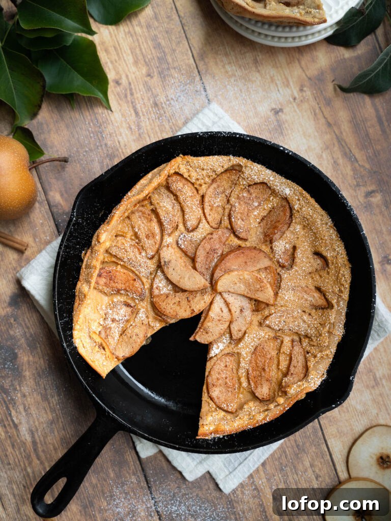 A pear clafoutis made in a cast iron