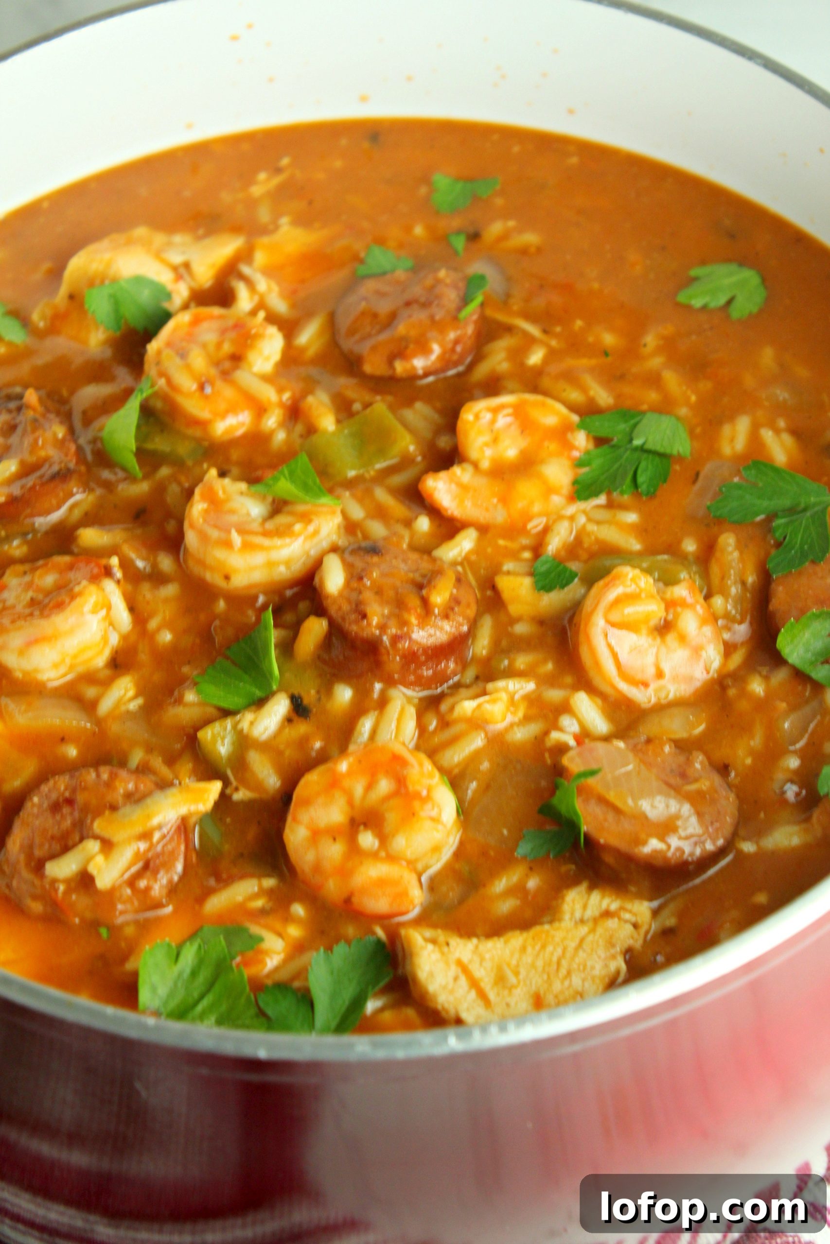 Creamy Cajun Jambalaya Soup Recipe for Cozy Weeknight Dinners 9 Sausage and shrimp