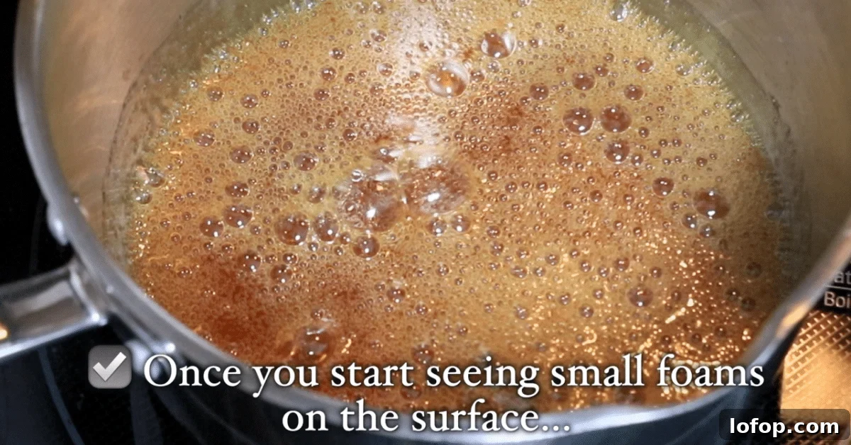 bubbling caramel with foams on the surface