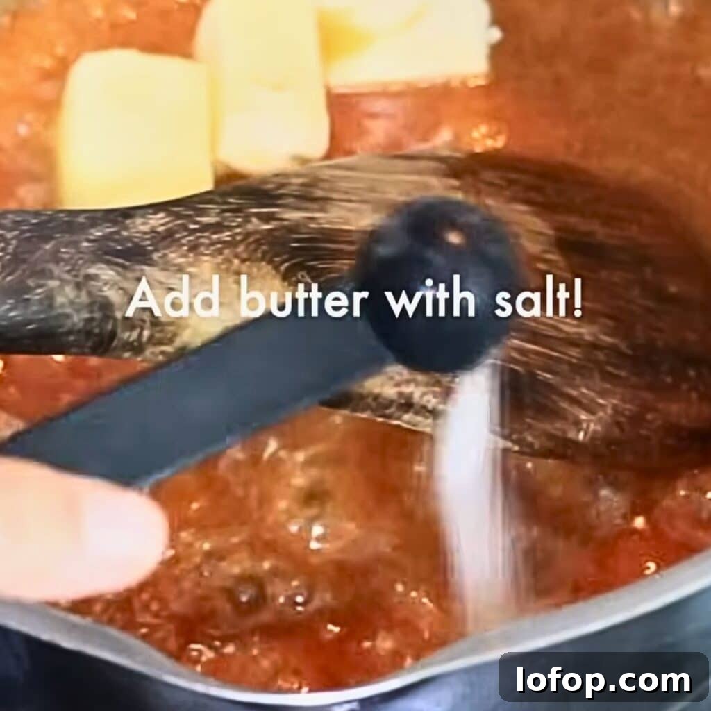 Adding butter and salt to the caramel sauce