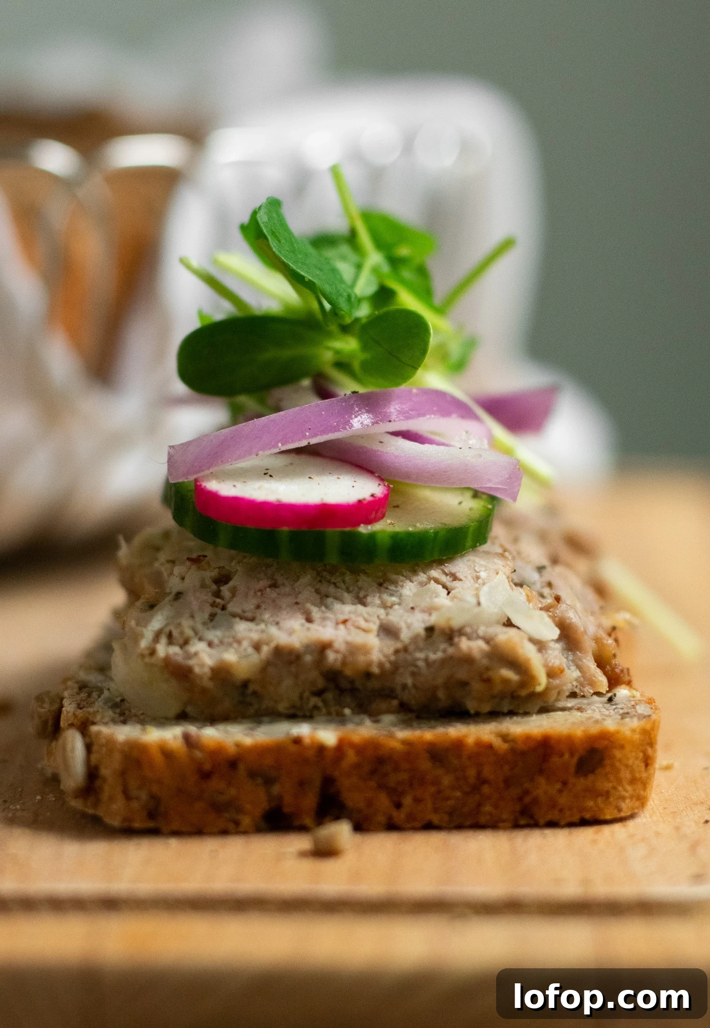 Smørrebrød: Traditional Danish Open-Faced Sandwich Recipes 19 A rye bread open faced sandwich topped with danish meatballs, cucumber, radish, onion, and micro greens.