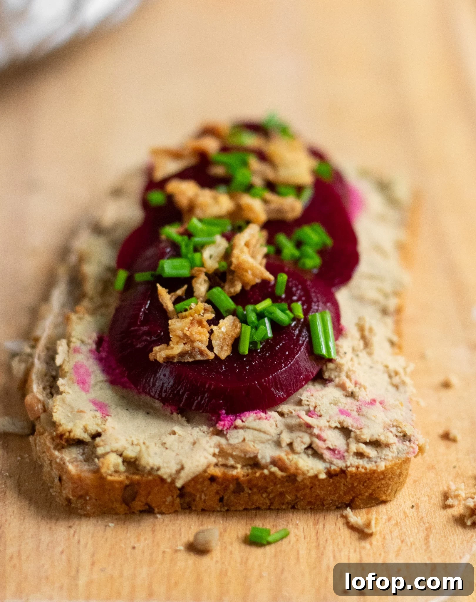 Smørrebrød: Traditional Danish Open-Faced Sandwich Recipes 21 A rye bread open faced sandwich topped with liver pate, pickled beets, and fried onions.