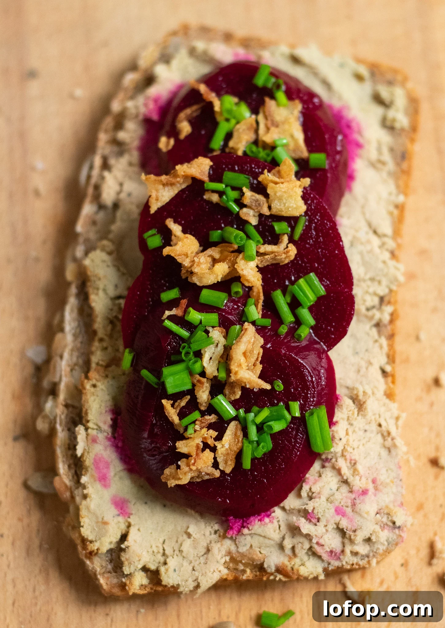 Smørrebrød: Traditional Danish Open-Faced Sandwich Recipes 22 A rye bread open faced sandwich topped with liver pate, pickled beets, and fried onions.