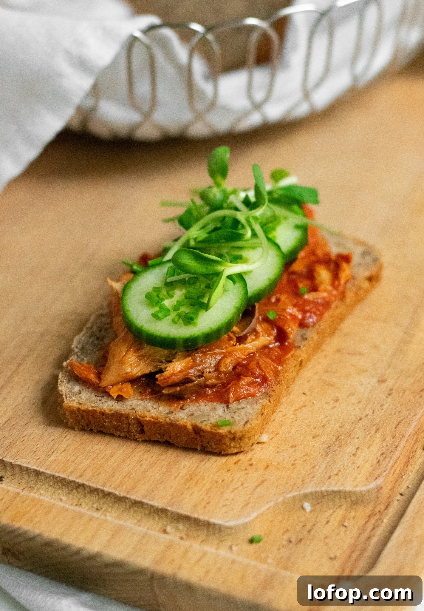 Smørrebrød: Traditional Danish Open-Faced Sandwich Recipes 30 A rye bread open faced sandwich topped with mackerel in tomato sauce, cucumber, chives, and micro greens.