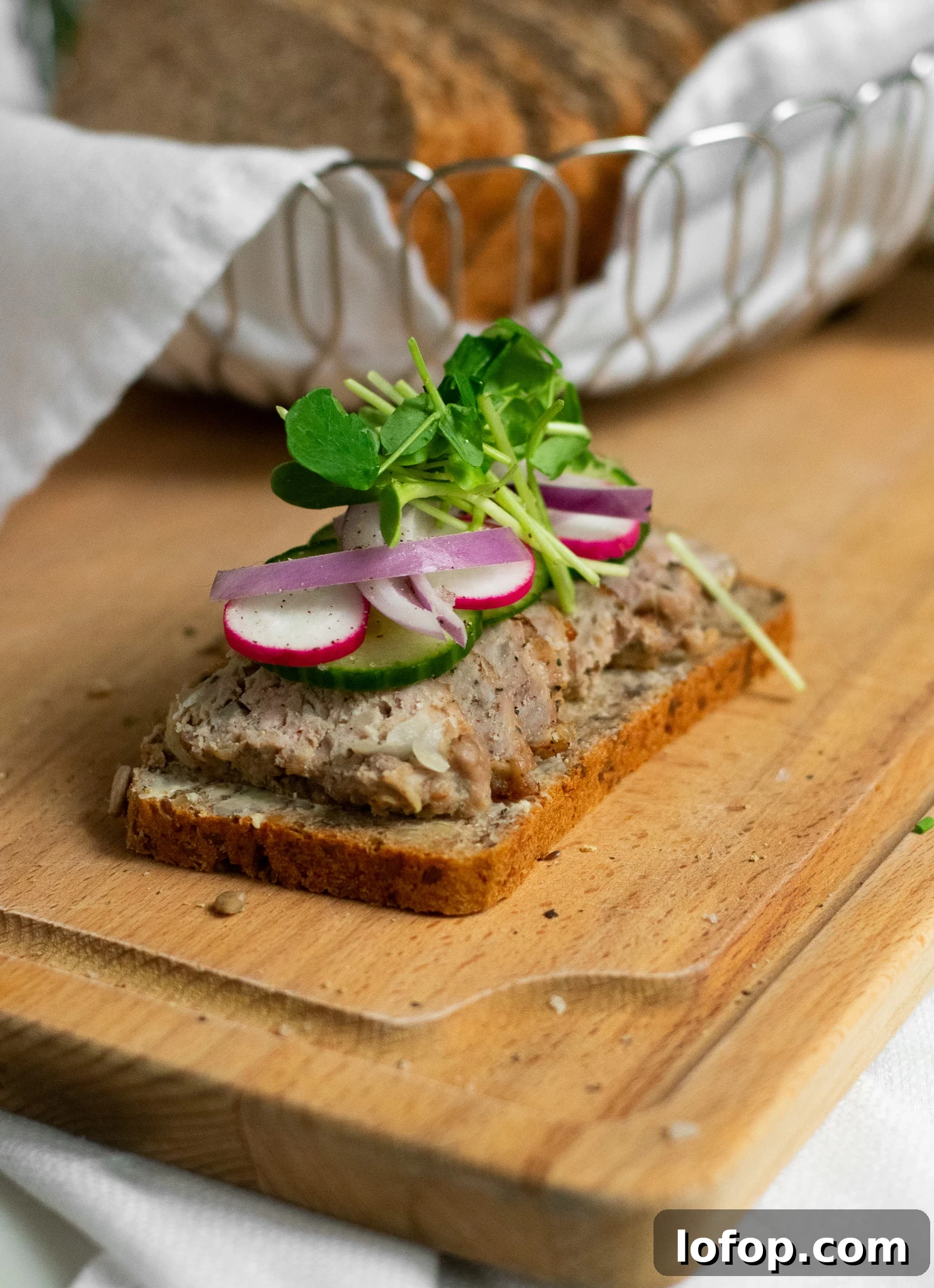 Smørrebrød: Traditional Danish Open-Faced Sandwich Recipes 35 A rye bread open faced sandwich topped with danish meatballs, cucumber, radish, onion, and micro greens.