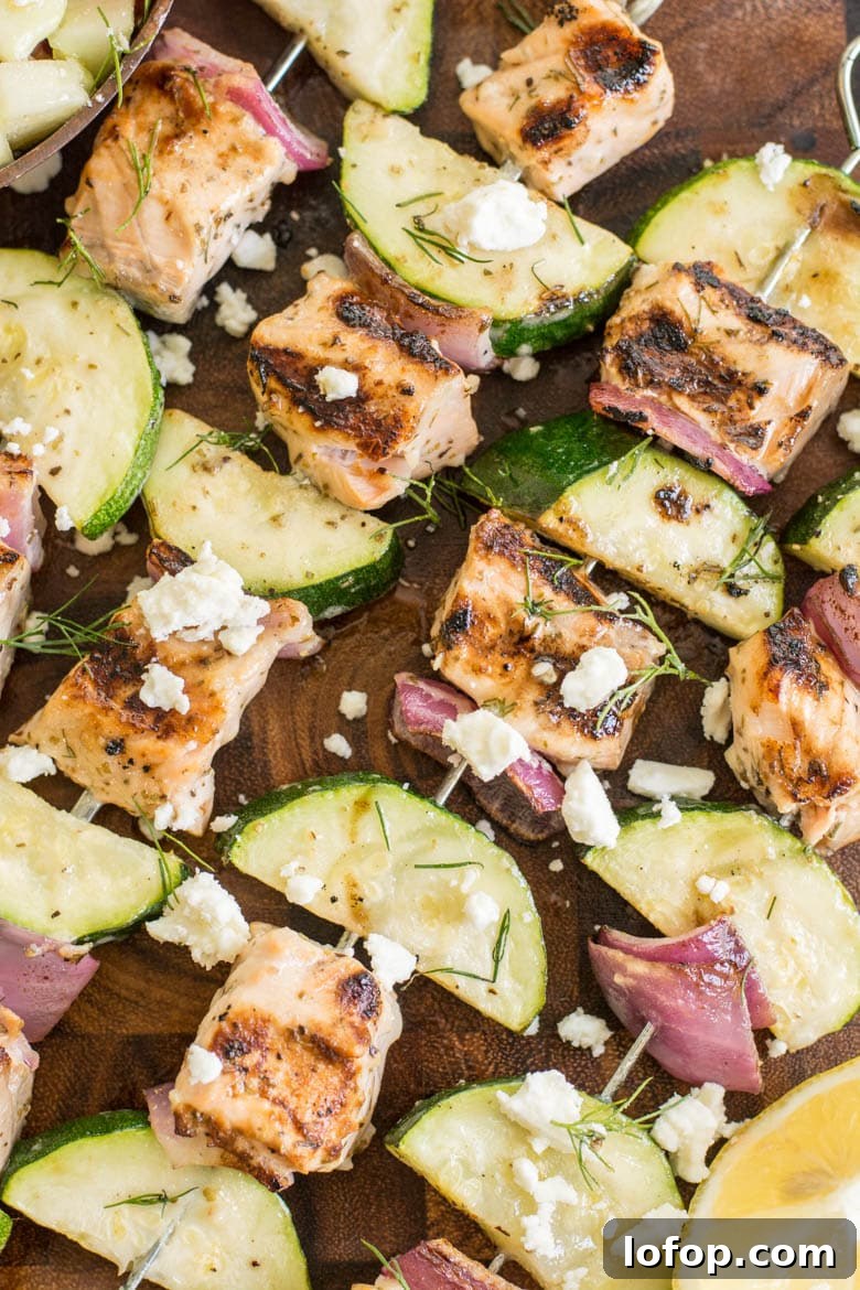 These Grilled Salmon Kabobs with Greek Marinade are loaded with lemon and garlic flavor!