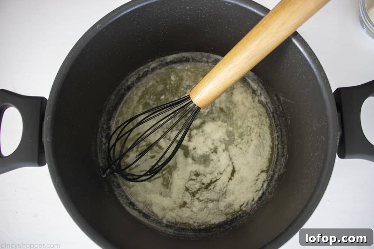 Melted butter in a large pot.