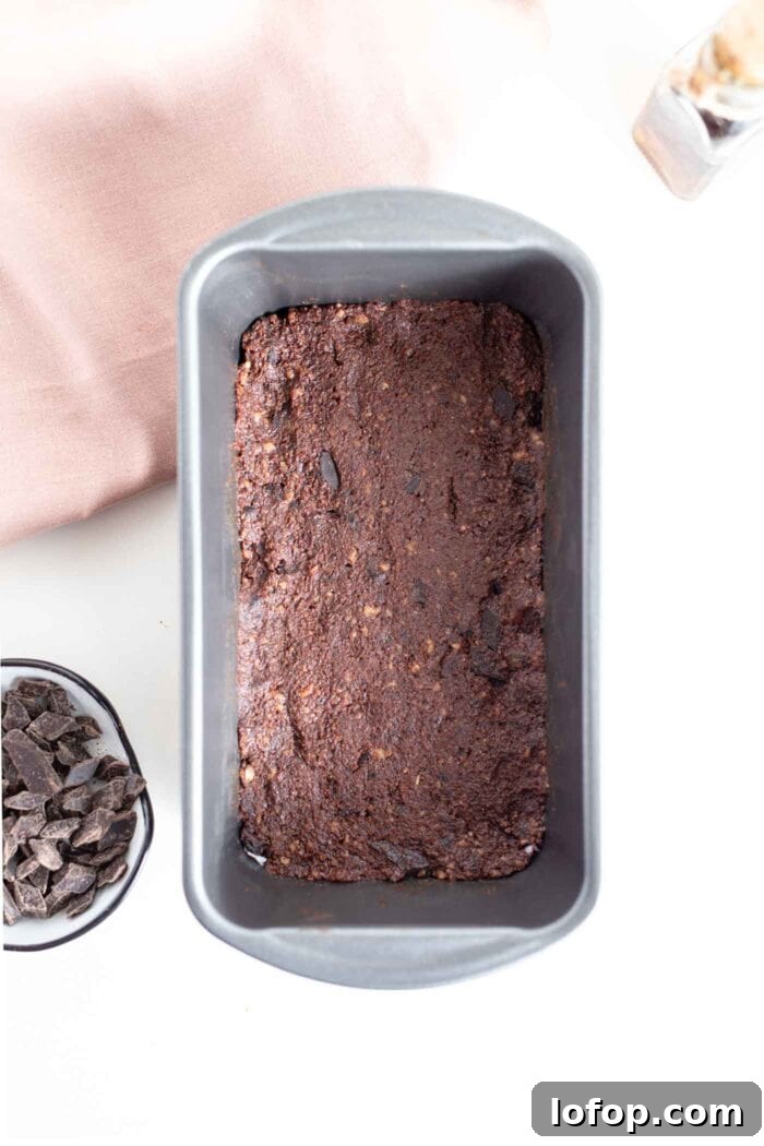 Vegan No-Bake Chocolate Brownies — Quick Raw Dessert Recipe 7 Raw brownies in a loaf pan.